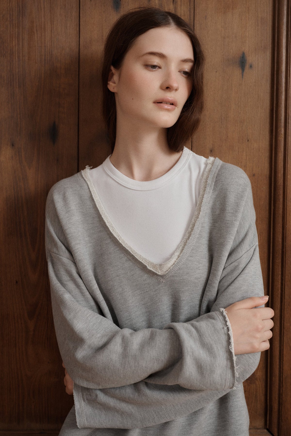 Relaxed heather grey V-neck sweatshirt crafted from soft cotton with a casual raw-edge finish. - VIR VITA
#color_heather grey