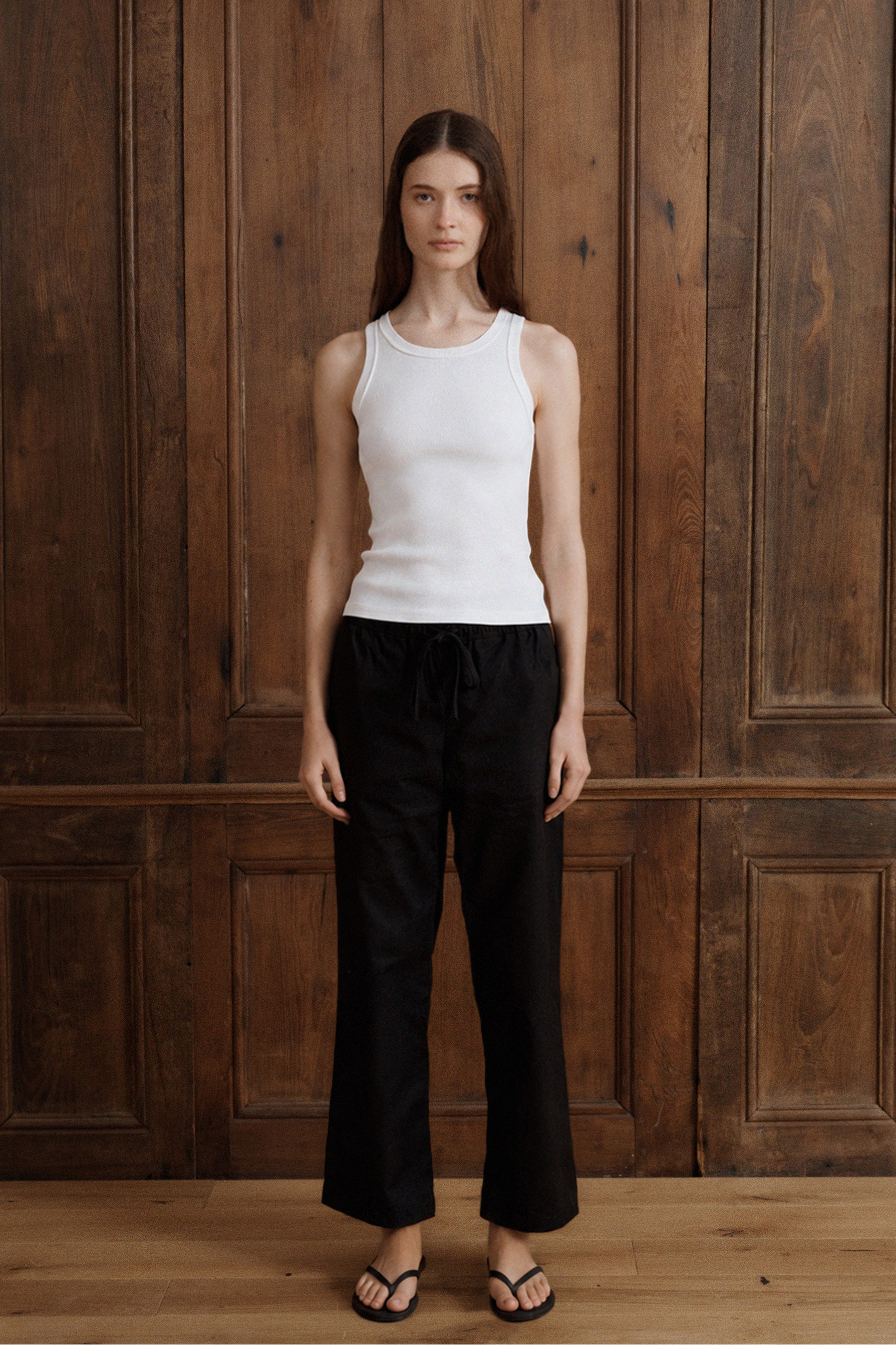 White Supima cotton rib tank top with a fitted silhouette and classic crew neckline. - VIR VITA
#color_white