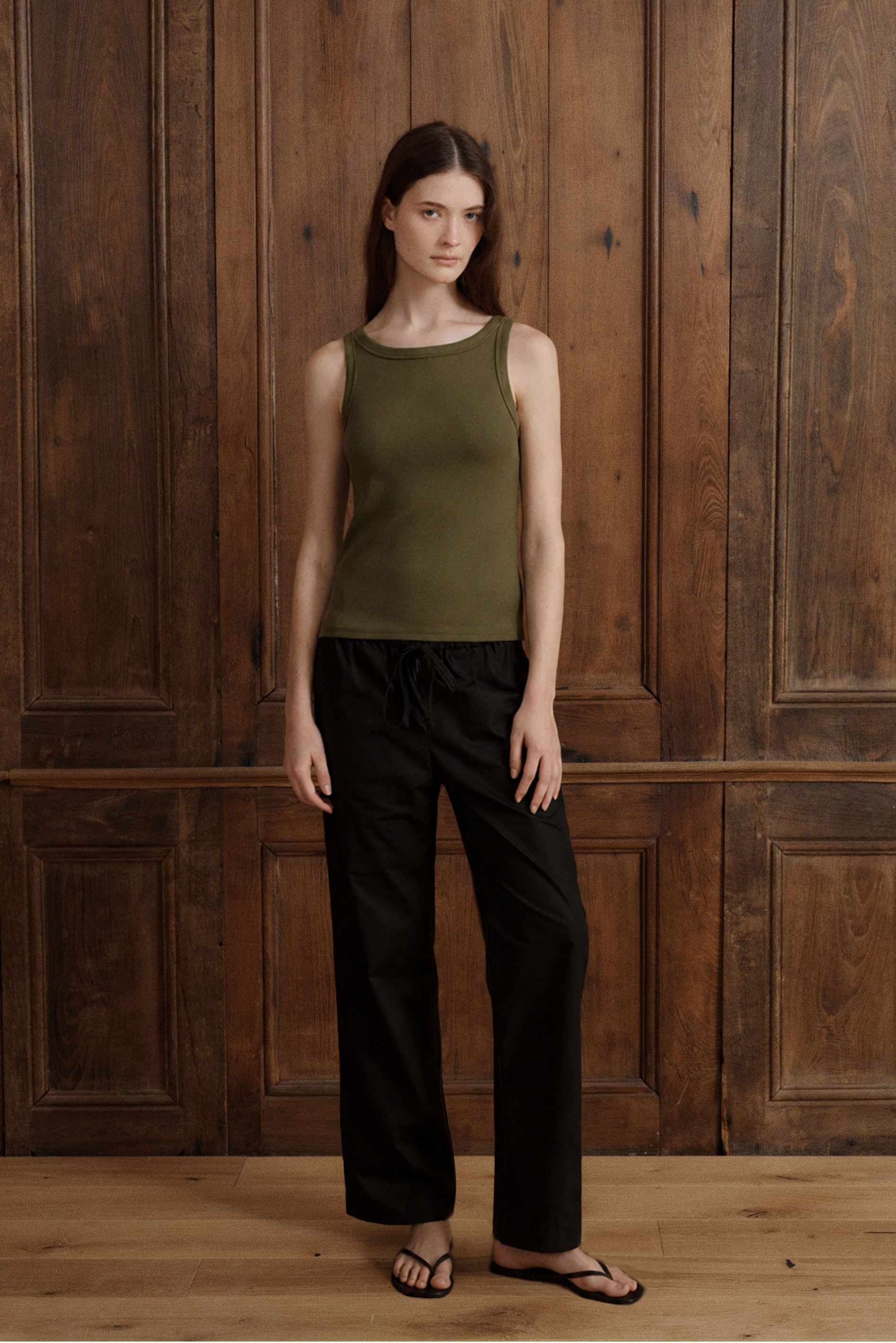 Moss green women’s ribbed tank top with a high neckline and fitted silhouette. - VIR VITA
#color_moss