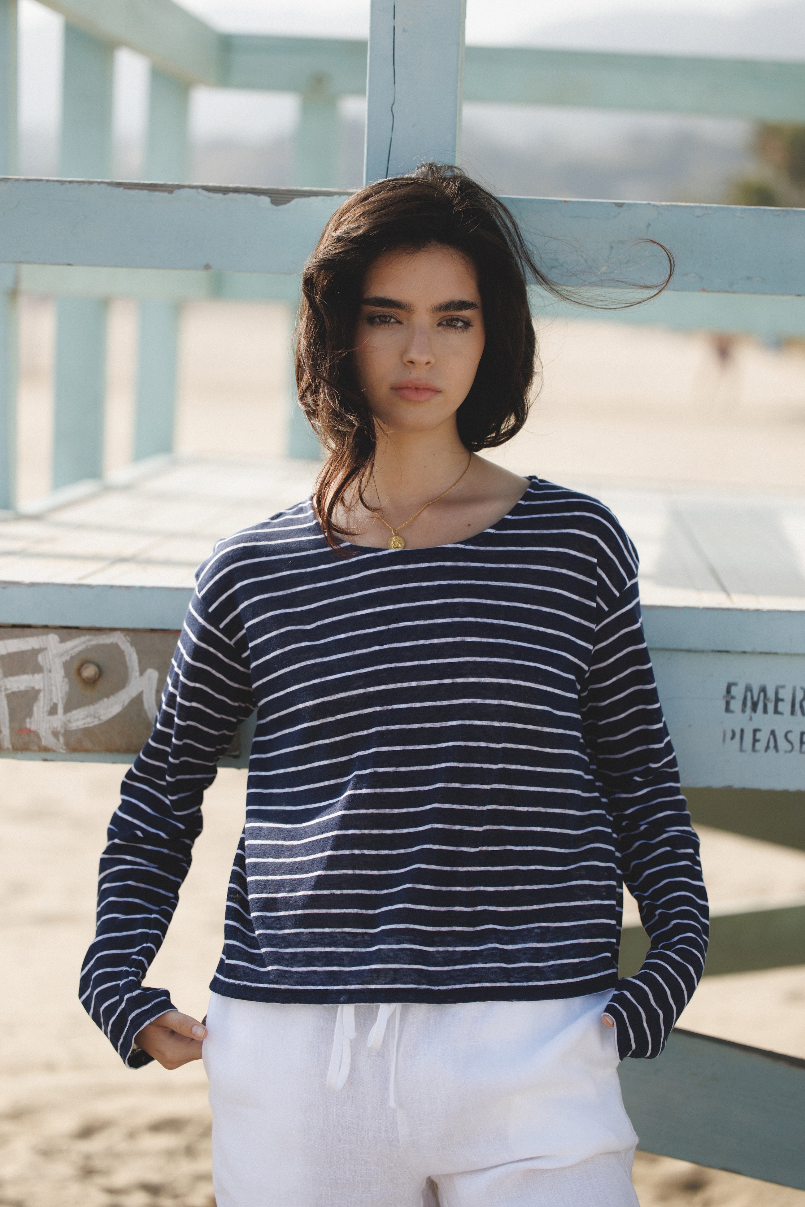 Female model wearing a 100% linen long sleeve striped top in navy/white featuring a flattering scoop neckline and oversized fit - VIR VITA
#color_classic navy/white