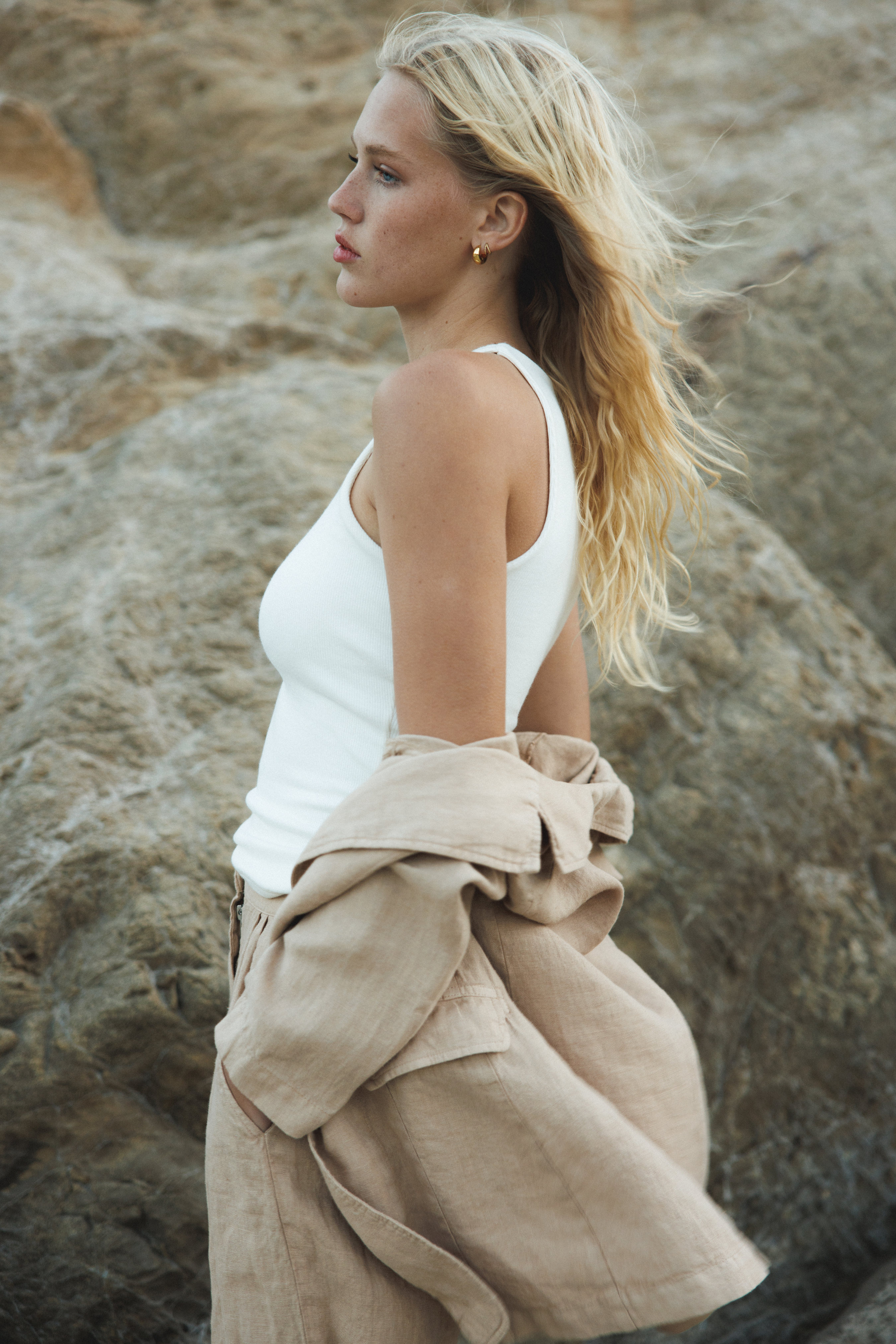 Female model wearing white sustainable micro modal ribbed double lined tank top with unique U neckline. Classic, timeless, elegant, french style. Natural organic clothing - VIR VITA
#color_coconut