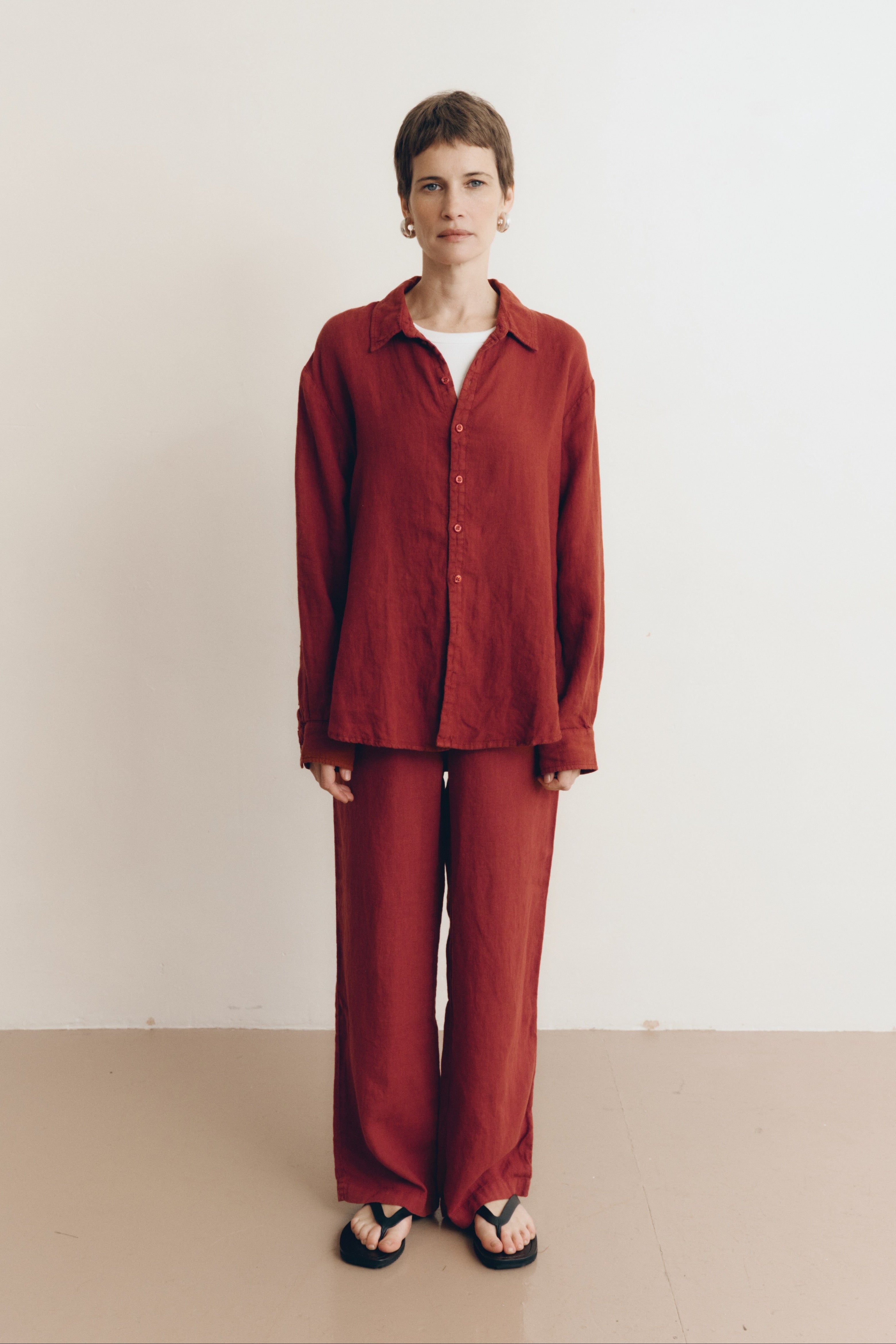 Sustainable dark red drawstring linen pant made of 100% linen featuring a relaxed straight-leg fit - VIR VITA #color_sun dried tomato