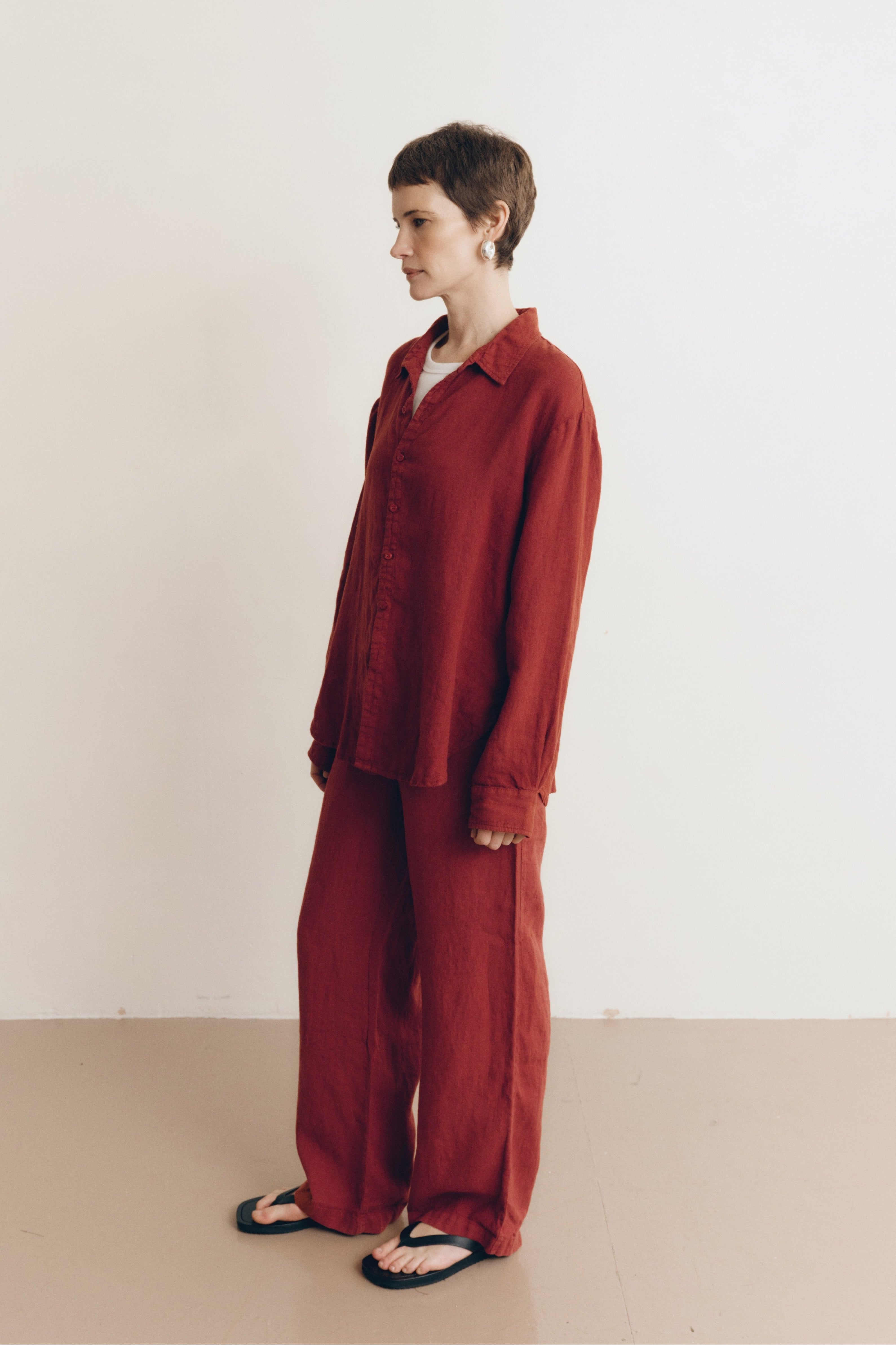 Sustainable dark red drawstring linen pant made of 100% linen featuring a relaxed straight-leg fit - VIR VITA #color_sun dried tomato