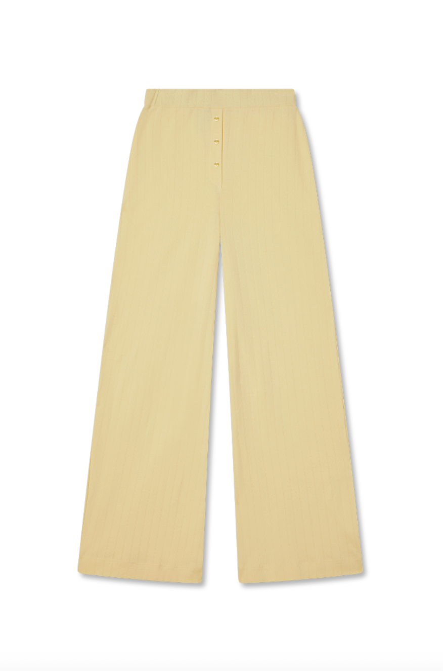 Sustainable pale yellow pointelle luxury lounge pant featuring a relaxed straight leg fit with matching brown italian buttons - VIR VITA
#color_butter