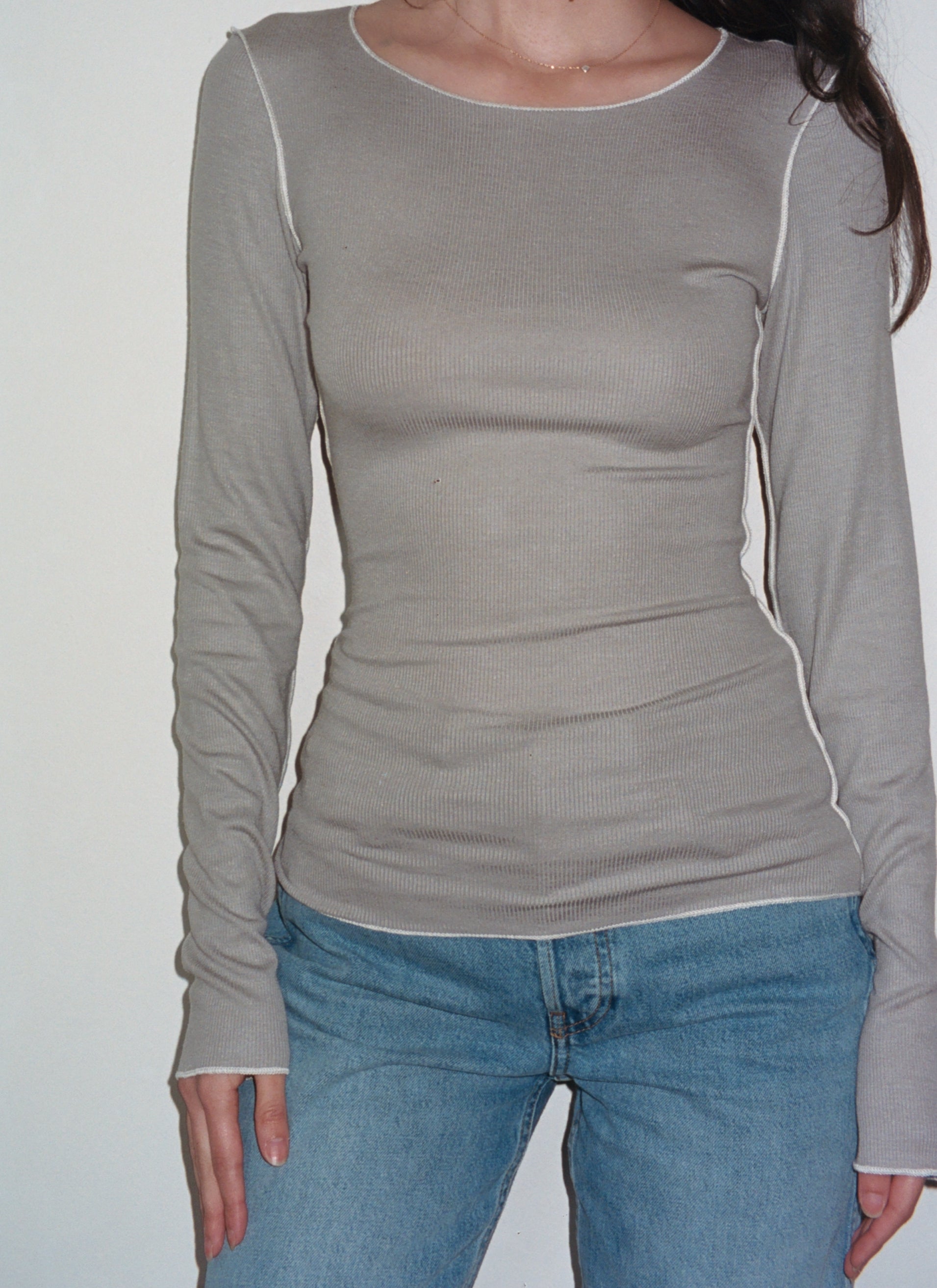 Female model wearing grey sustainable micro modal long sleeve with merrow stitch detailing. Classic, timeless, elegant, french style. Natural organic clothing - VIR VITA

#color_grey