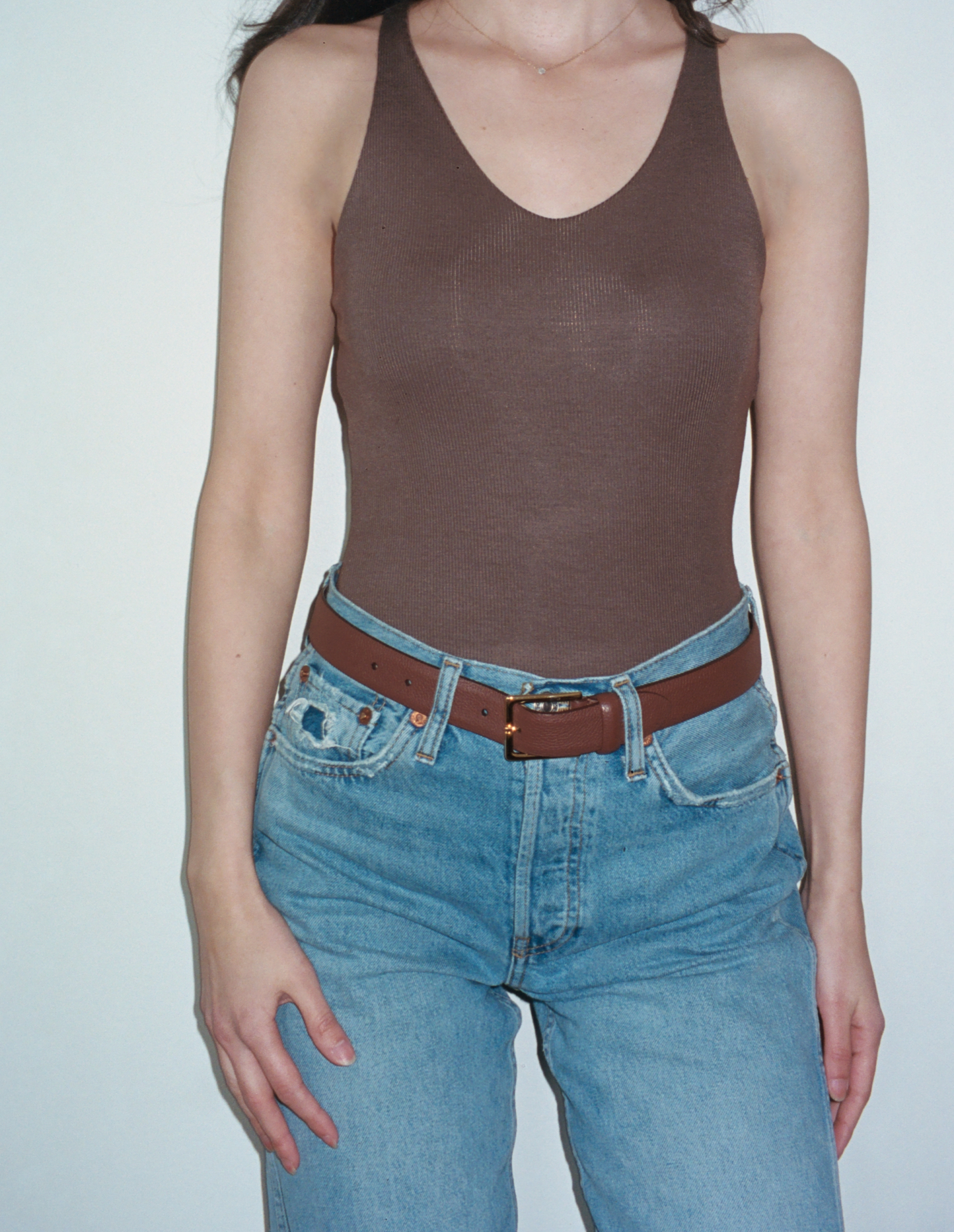 Female model wearing brown sustainable micro modal ribbed double lined tank top with unique U neckline. Classic, timeless, elegant, french style. Natural organic clothing - VIR VITA


#color_chestnut