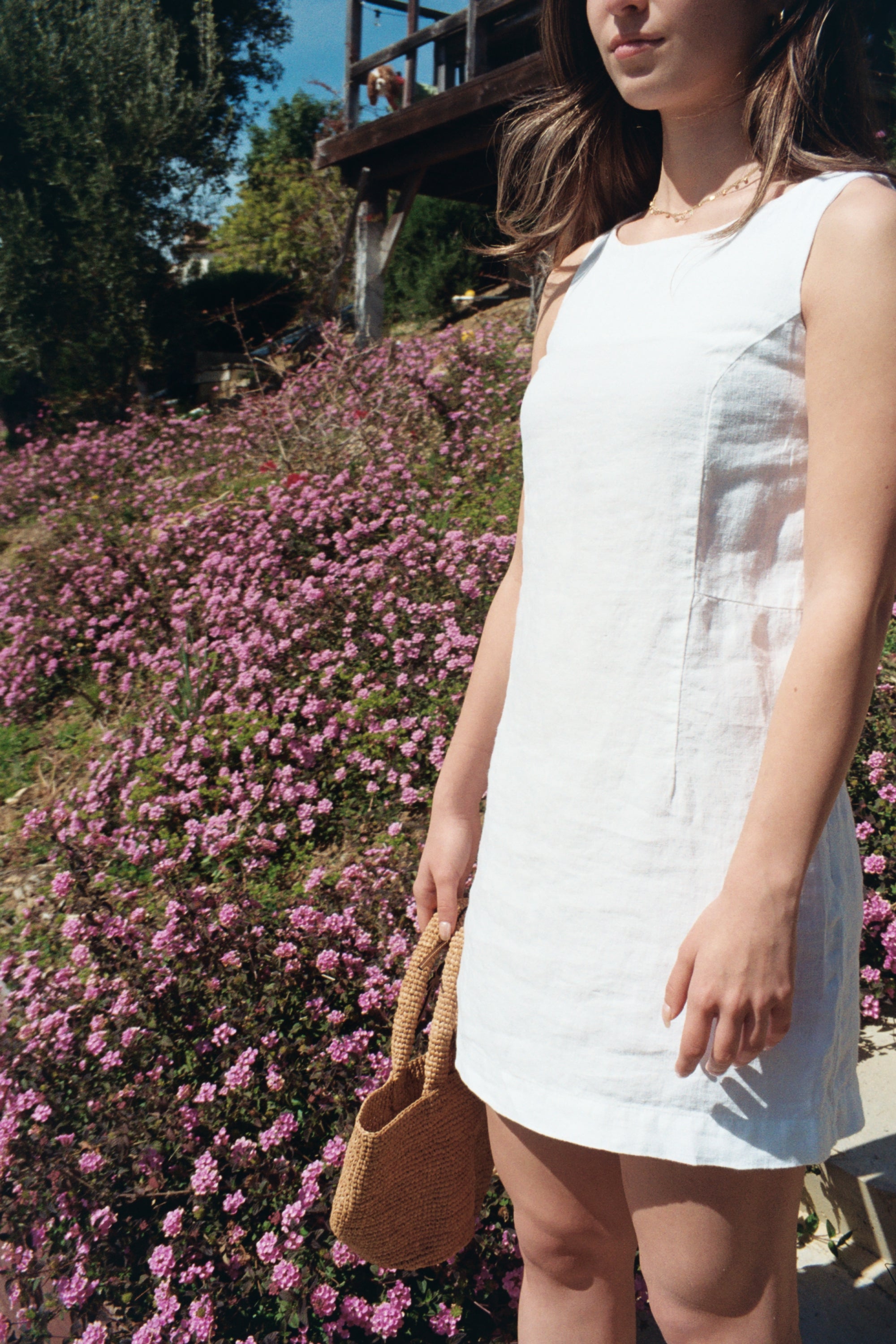 
female model wearing sustainable white linen dress- VIR VITA

#color_white