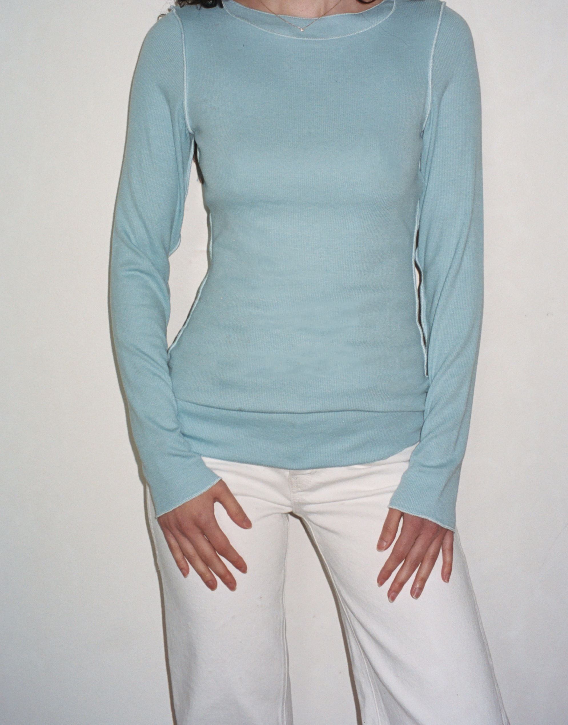 Female model wearing sustainable micro modal baby blue buttery soft double lined long sleeve ribbed top. Classic, timeless, elegant, french style. natural organic clothing- VIR VITA

#color_baby blue