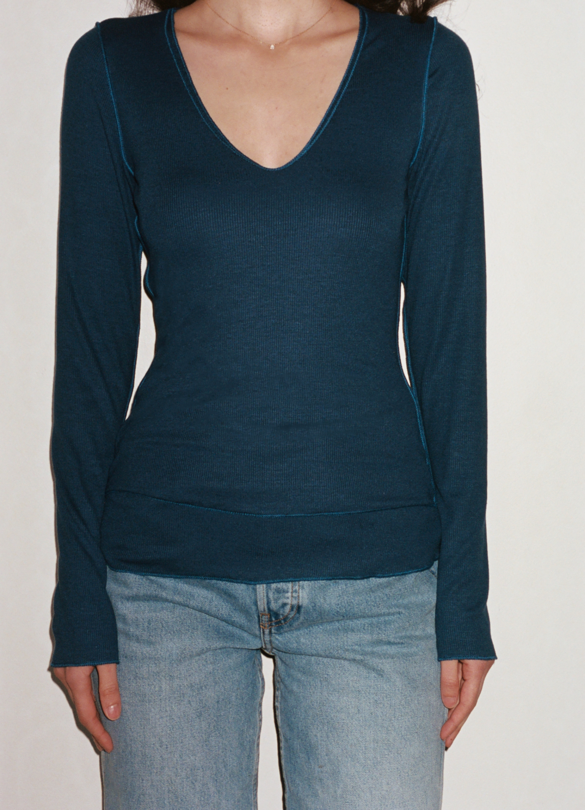 Female model wearing sustainable micro modal navy buttery soft double lined v neck long sleeve ribbed top. Classic, timeless, elegant, french style. natural organic clothing- VIR VITA

#color_navy