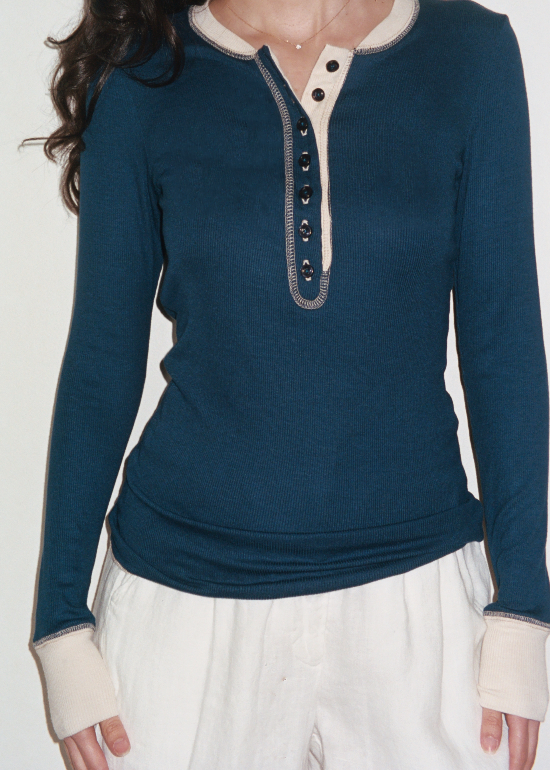 Female model wearing navy sustainable micro modal long sleeve henley top with italian button detailing. Classic, timeless, elegant, french style. Natural organic clothing - VIR VITA


#color_navy