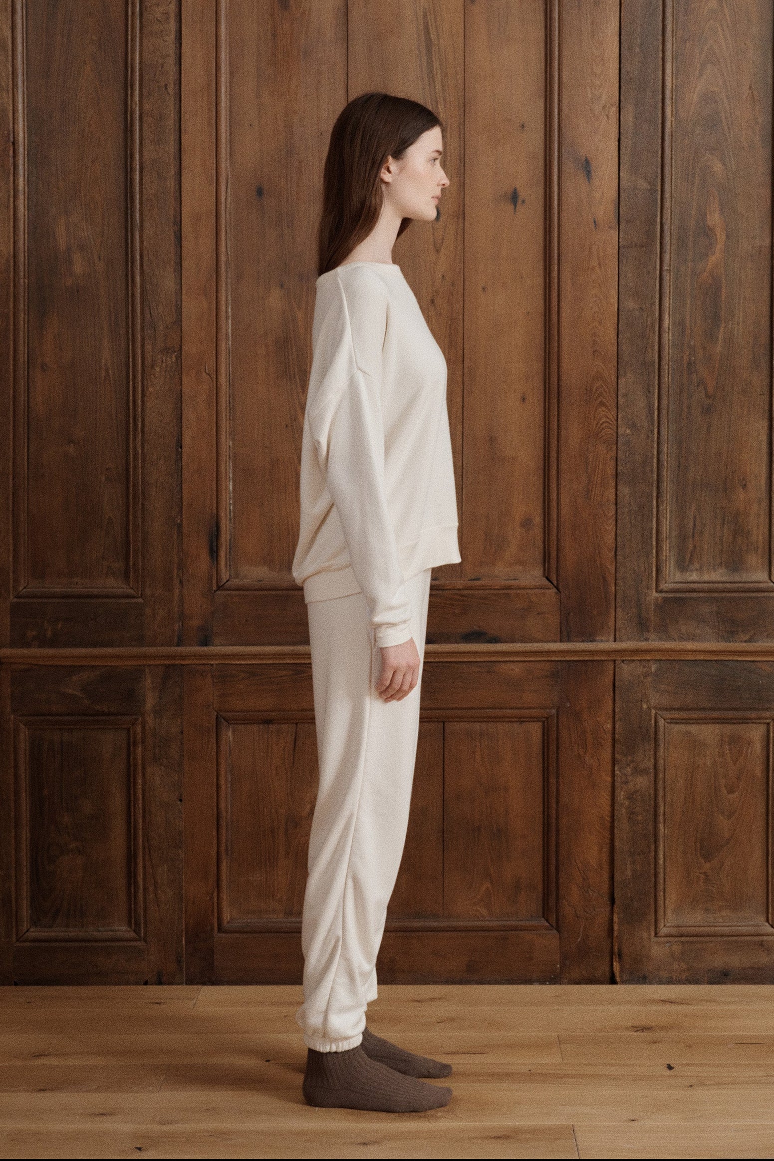 A minimalist French terry cotton sweatshirt designed with dropped shoulders and soft modal detailing along the crew neckline, cuffs, and hem. - VIR VITA
#color_natural