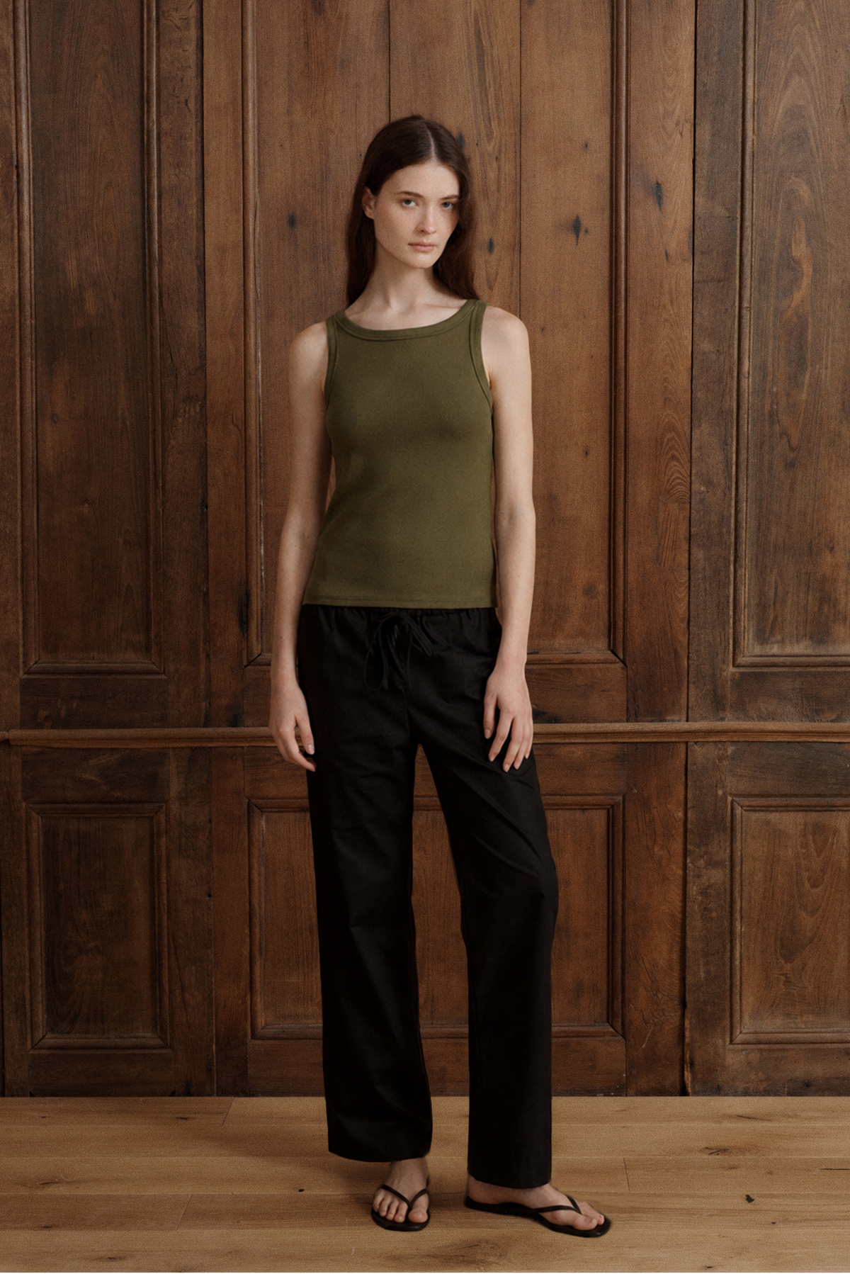 Moss green women’s ribbed tank top with a high neckline and fitted silhouette. - VIR VITA
#color_moss