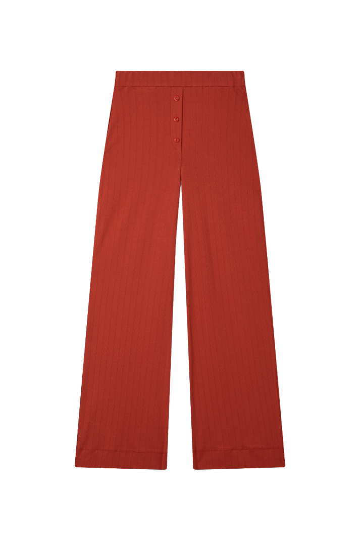 Sustainable pointelle lounge pants made of 100% recycled cotton featuring a relaxed straight leg fit in red - VIR VITA
#color_apple red