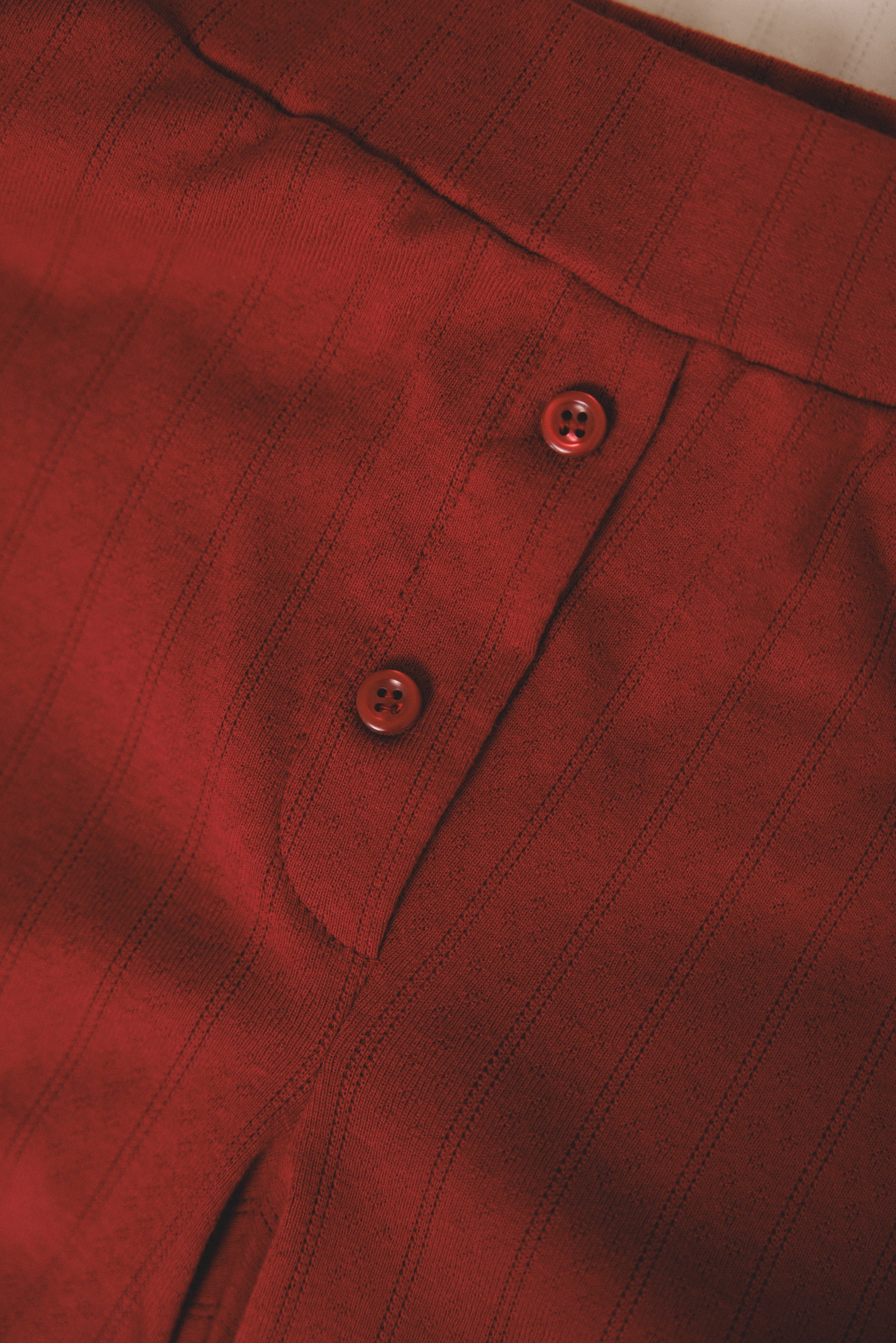 Red pointelle luxury lounge pant with matching red italian buttons-  VIR VITA
#color_sun dried tomato
